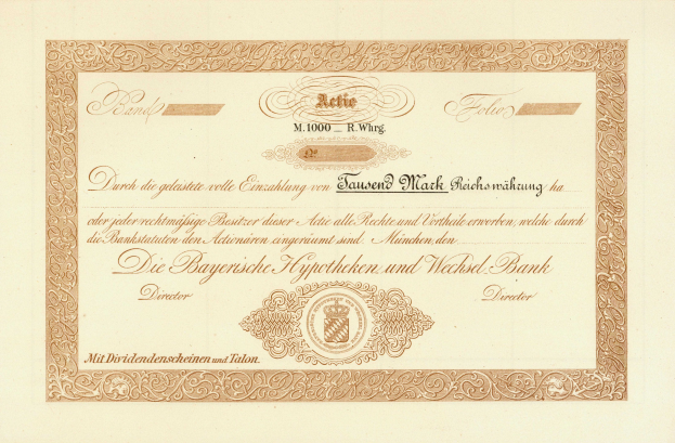 Alter Wertpapierschein mit goldenem Rand, der ein Porträt eines Mannes und Text zeigt, wahrscheinlich eine Anleihe.