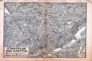 Ein detaillierter alter Stadtplan von Stuttgart auf Papier, der Straßen, Gebäude und Sehenswürdigkeiten zeigt, mit zusätzlichem Text, der Informationen bereitstellt.