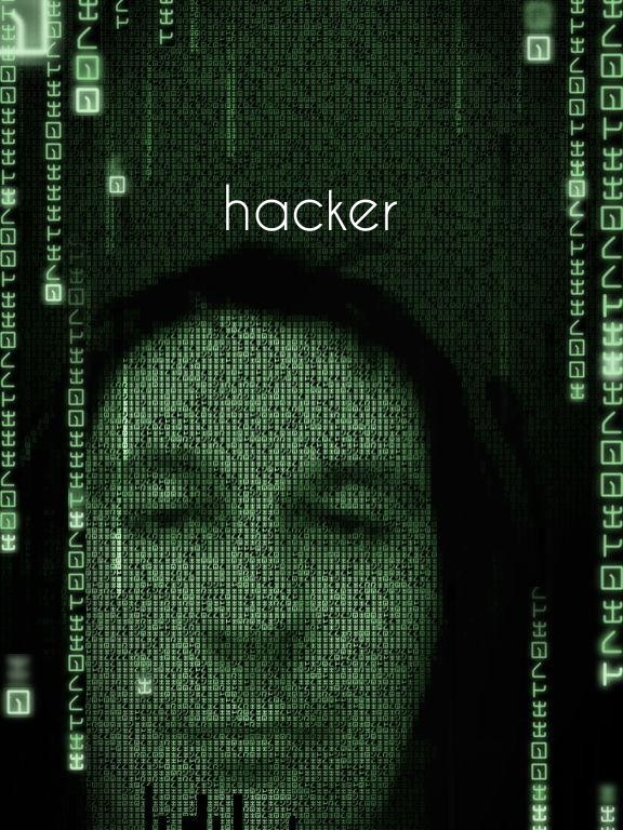 Gesicht eines Hackers auf einem Bildschirm mit dem Wort "Hacker" in Binärcode.