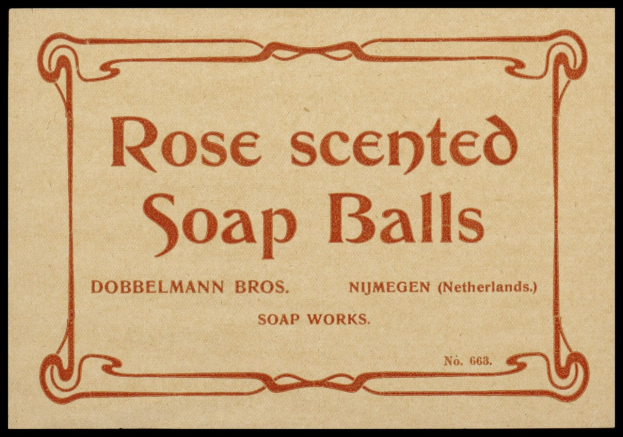 Plakat mit fetter weißer Schrift "Rose duftende Seifenkugeln" auf schwarzem Hintergrund.